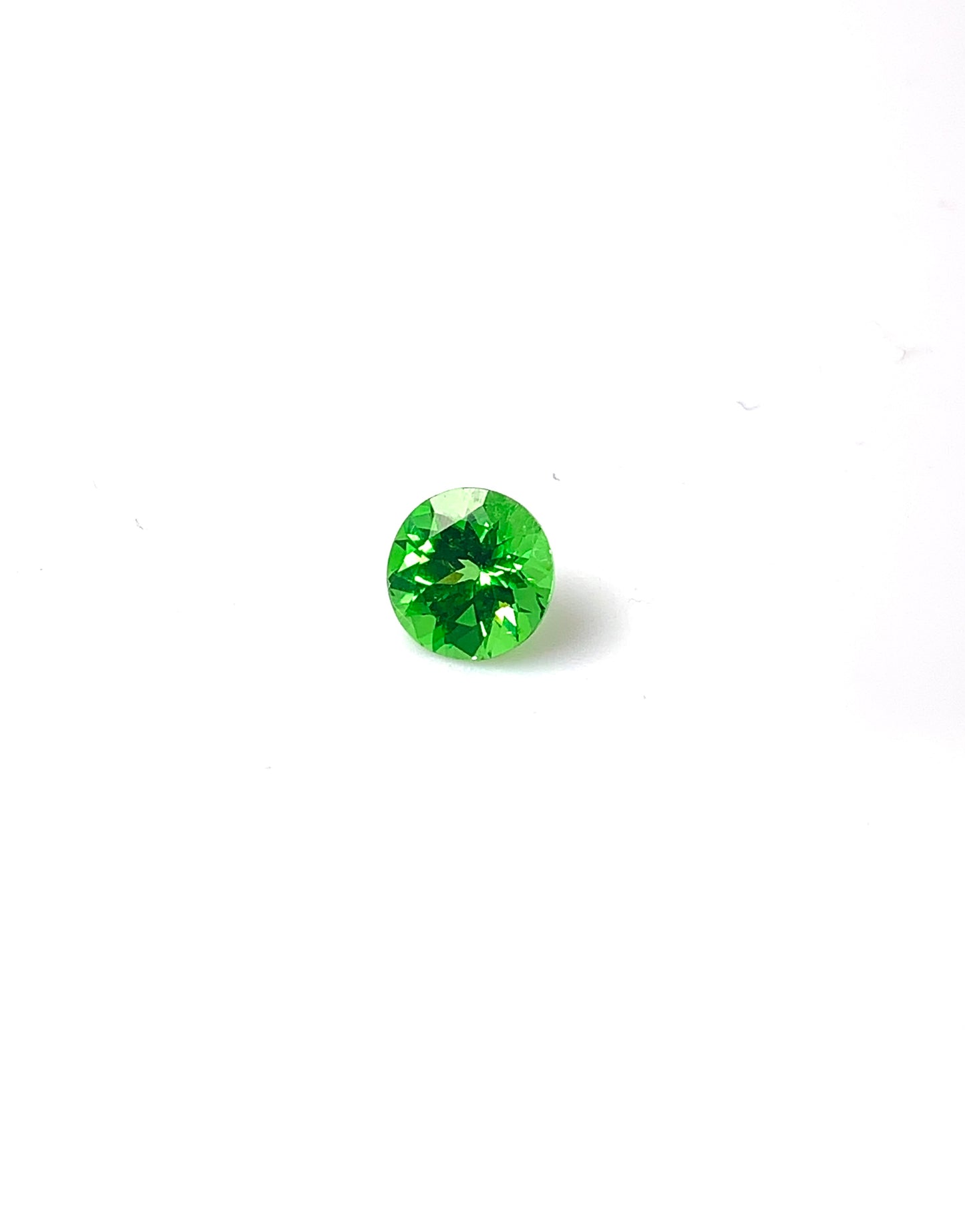 Tsavolite garnet fac. round 6mm, 0.82cts