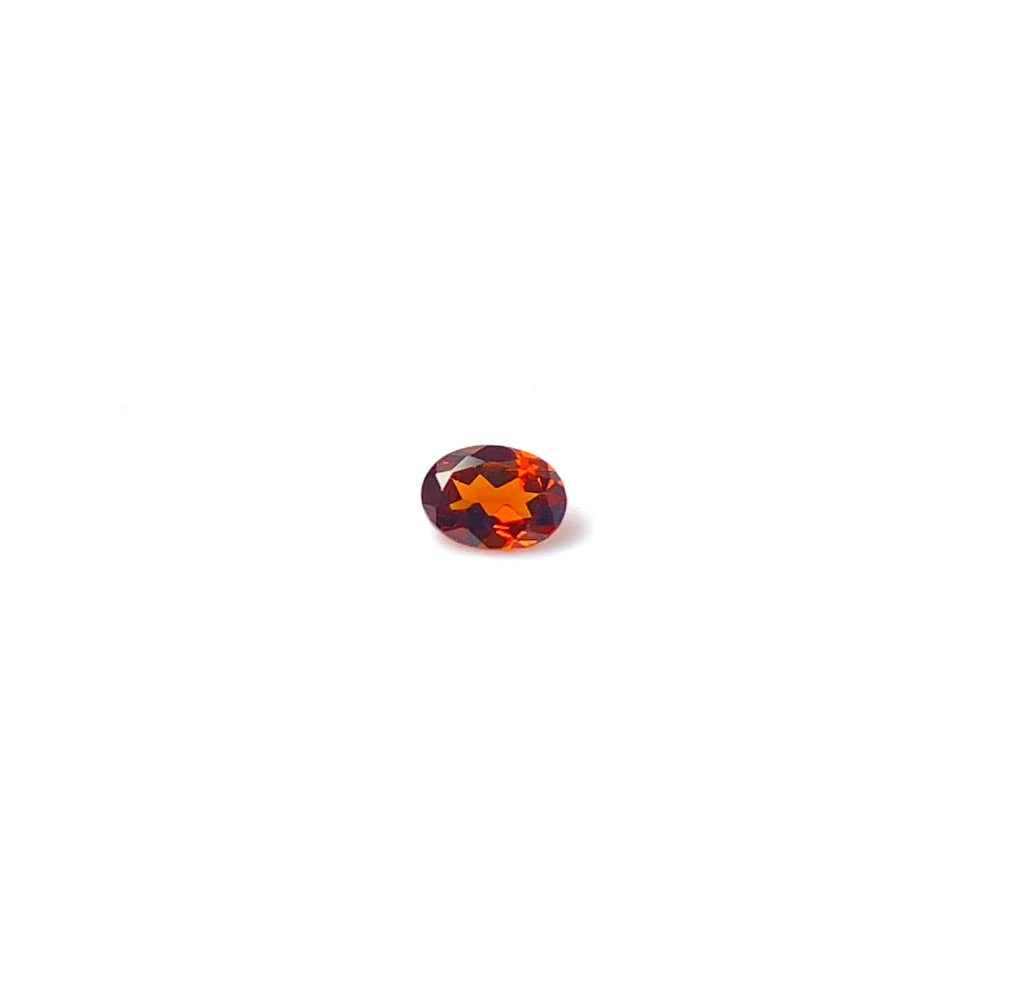 Hessonite garnet fac., oval